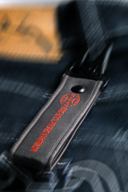 Porte-clé Mosimann X Supported de couleur gris et rouge